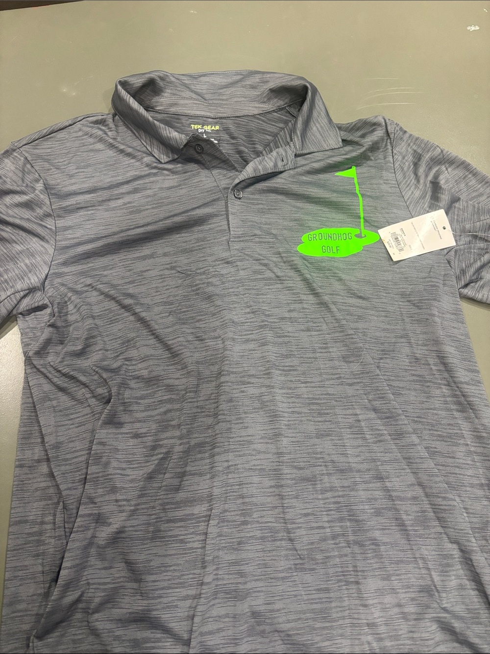 NWT…Men’s Gray Polo Shirt with Green Groundhog Golf Logo
